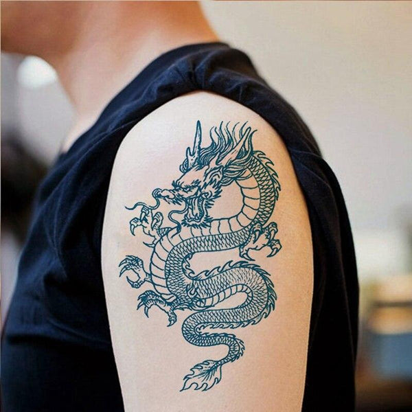 Two heads dragon 🐉 with lotus 🪷 and fire 🔥 #dragontattoo #dragontattoos  #dragontatoodesign #dragondesign #upperarmtattoo #cool... | Instagram
